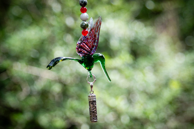 hummingbird with silver keepsake pendant